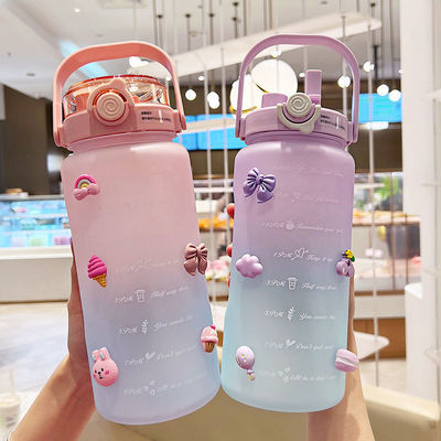 Bouteille d'eau motivationnelle avec marqueur de temps sans BPA 64OZ et conception de couleur en dégradation