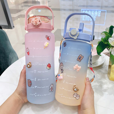 Bouteille d'eau motivationnelle avec marqueur de temps sans BPA 64OZ et conception de couleur en dégradation